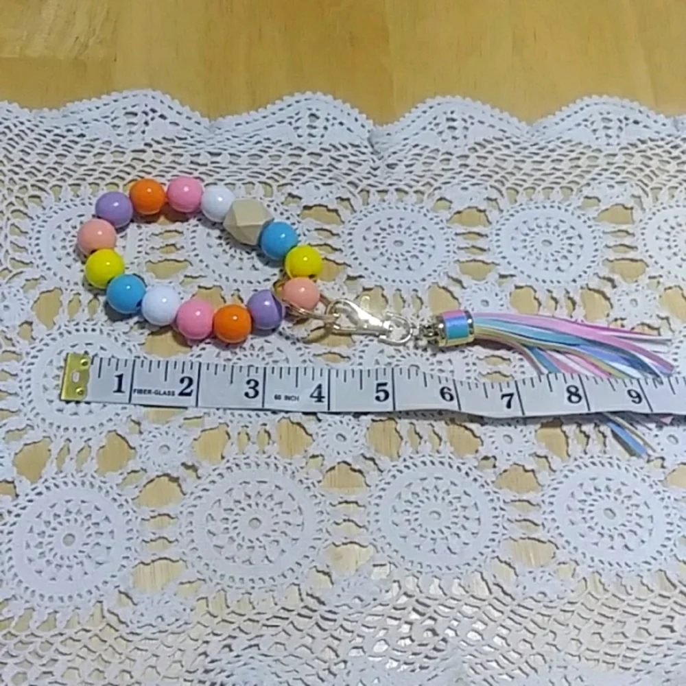Cute clunky stretch bracelet keyring with tassel